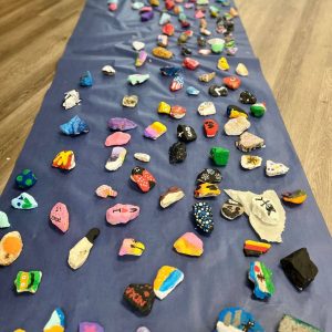 small, consistent actions with painted rocks for kindness