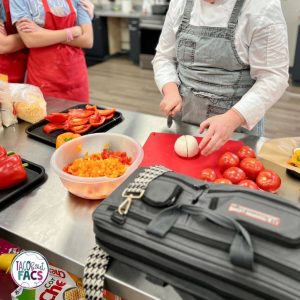 cutting vegetables; Teaching expectations for cooking with a guest chef