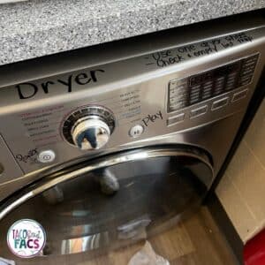 labeling the dryer to makes sure students know the difference when doing laundry and the steps to dry a load of towels.